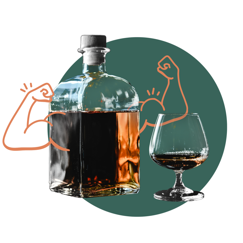 Bottle of brandy with biceps and glass